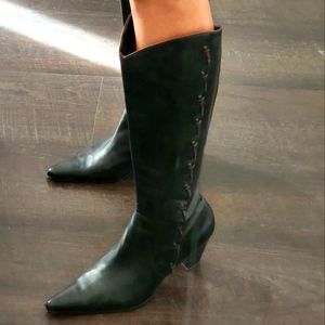 Tall black and pointy women's leather boots. Size 8.5.